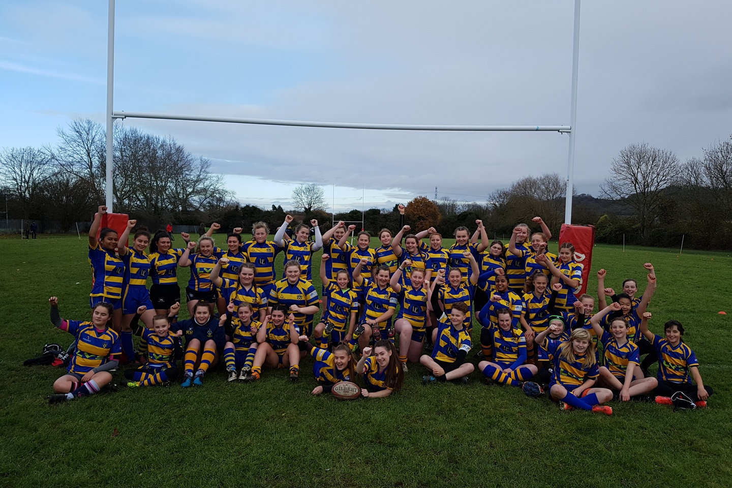 Old richians rfc girls celebrating the installation of the new rugby