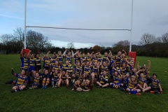 Old Richians RFC Girls celebrating the installation of the new rugby posts 